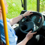 Bus driver sitting in his bus Bus driver sitting in his bus