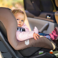 Little girl in carseat