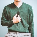 Man holding a gun Man holding a gun