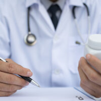 Doctor writing prescription Doctor writing prescription