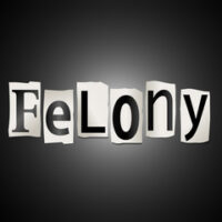 sign that reads felony sign that reads felony