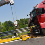 Crane pulling the remains of fatal truck accident Crane pulling the remains of fatal truck accident