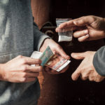 two men dealing narcotics two men dealing narcotics