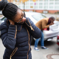 Woman Suffering From Neck Pain After Car Accident Woman Suffering From Neck Pain After Car Accident