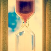 Hourglass against blue sky Hourglass against blue sky