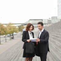 male lawyer speaking with female client.