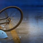 Accident car crash with bicycle on road ,rainy day at night time. Accident car crash with bicycle on road ,rainy day at night time.