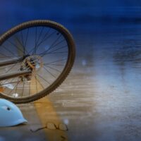 Accident car crash with bicycle on road ,rainy day at night time. Accident car crash with bicycle on road ,rainy day at night time.