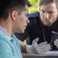 Man stopped by policeman Man stopped by policeman