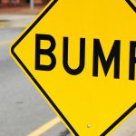 close up on bump sign at the side of street close up on bump sign at the side of street