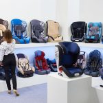 Buyer in the store of children's car seats Buyer in the store of children's car seats