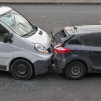 Auto accident involving two cars Auto accident involving two cars on a city street