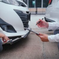 Car insurance employees with customers who have had a car accident