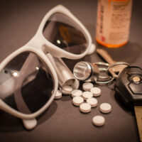 Pills, Sunglasses, and Car Keys Pills, Sunglasses, and Car Keys
