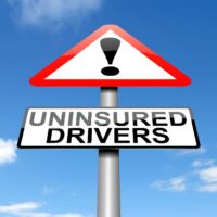 Illustration depicting a sign with an uninsured drivers concept.