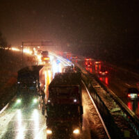 Car accident on slippery road at night during rainfall